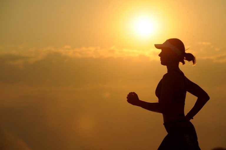 Is Keto Good for Your Heart? Woman With White Sunvisor Running