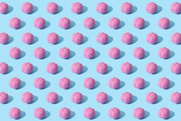 Is Keto Bad for Your Brain? Photograph of Pink Brains on a Blue Surface